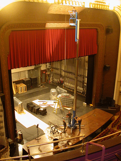 Cutting a hole in the proscenium for the new D+B speaker cluster