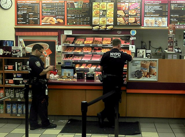 "Cops in a Donut Shop 2011 Shankbone" by David Shankbone
